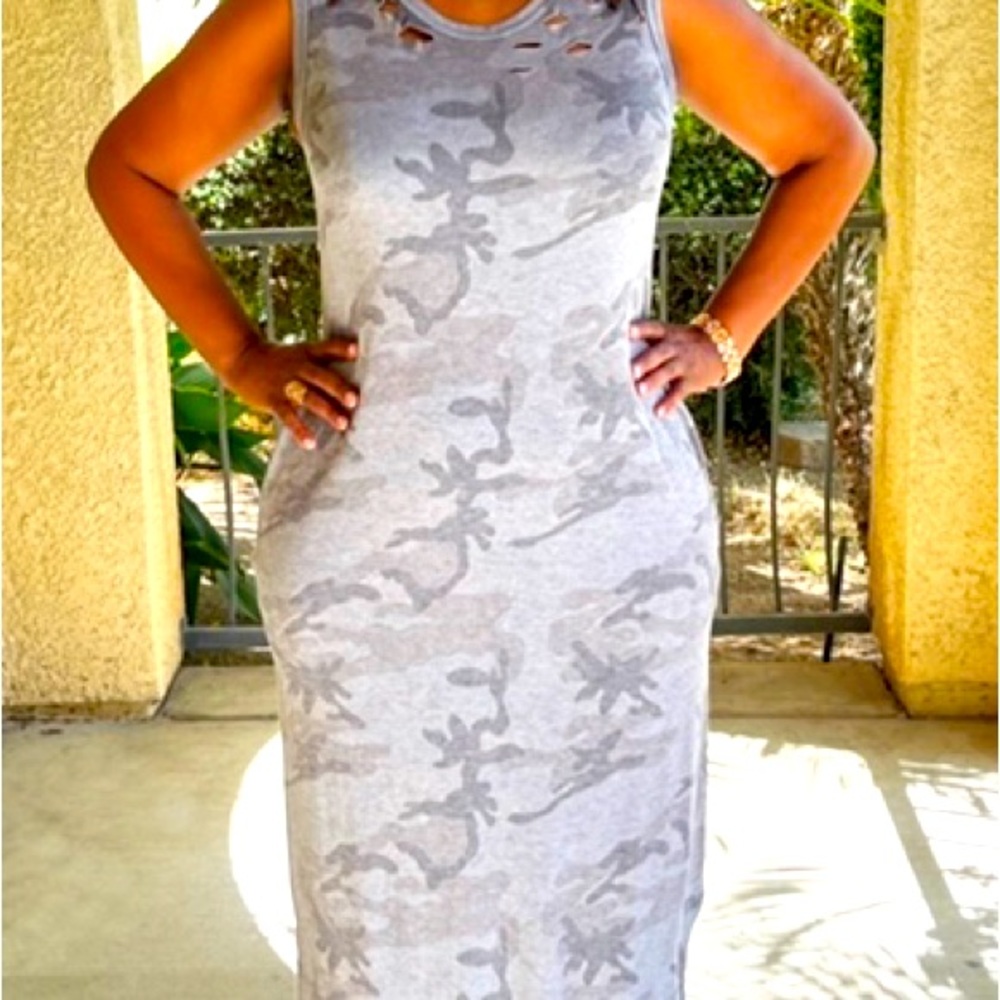 Camouflage dress. Available in sizes S, M and L.